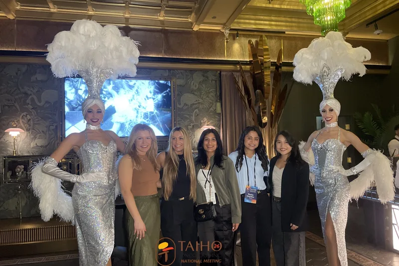 Roaming photography at corporate event with Las Vegas showgirls